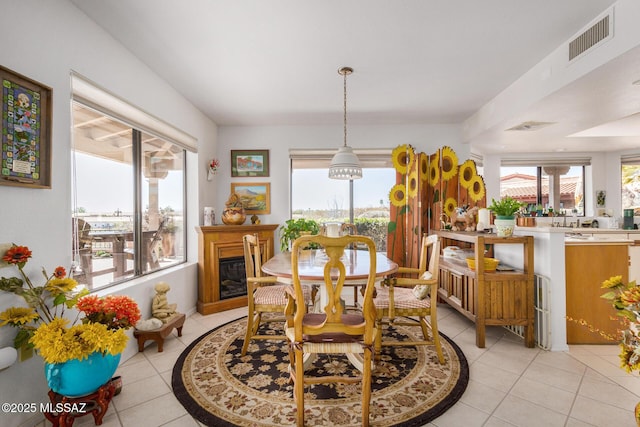 dining room featuring light tile patterned floors