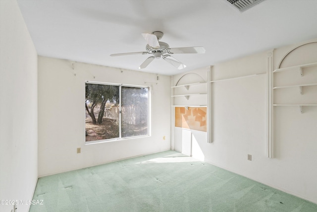 interior space featuring ceiling fan