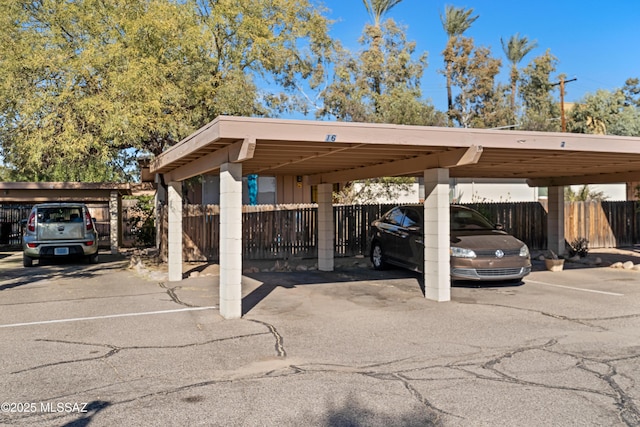 view of parking with a carport