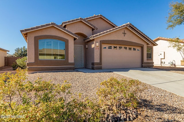 view of front of property with a garage