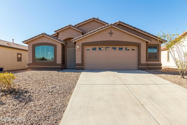 view of front of home with a garage