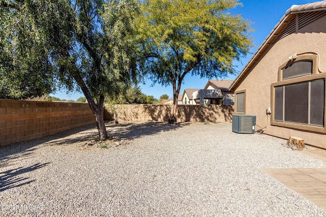 view of yard with a patio and cooling unit