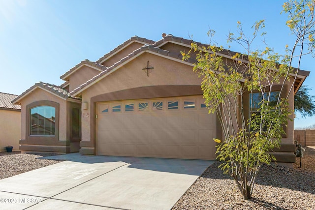 view of front of home with a garage