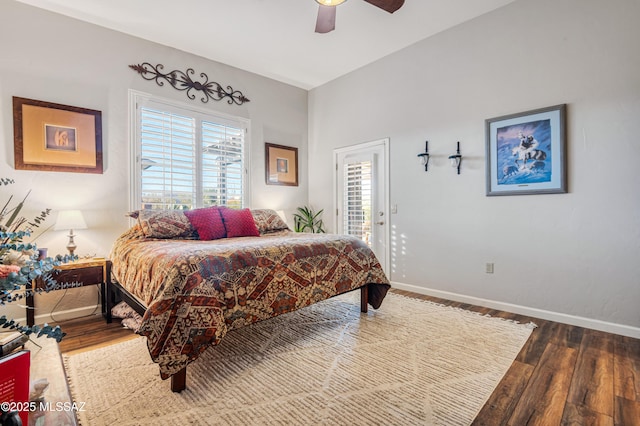 bedroom with ceiling fan, access to outside, and dark hardwood / wood-style flooring