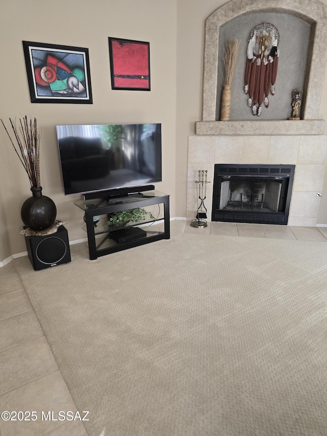 living room featuring tile patterned flooring and a fireplace