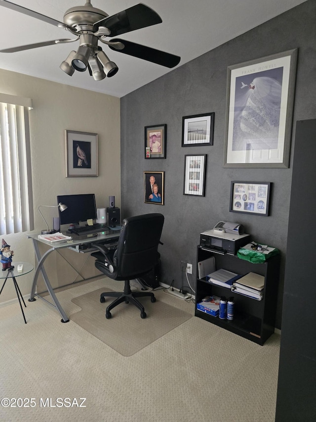 office area with ceiling fan and carpet