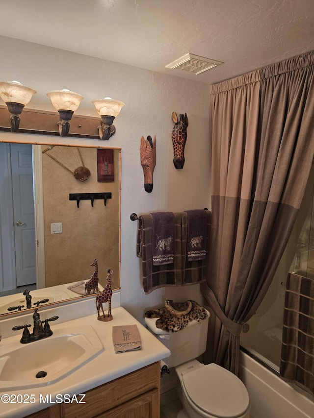 full bathroom with vanity, toilet, and enclosed tub / shower combo