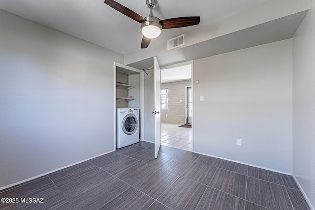 clothes washing area with washer / clothes dryer and ceiling fan