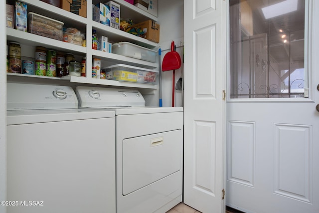 laundry room featuring independent washer and dryer