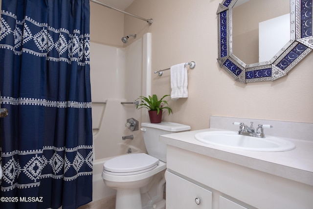 full bathroom featuring shower / tub combo with curtain, vanity, and toilet