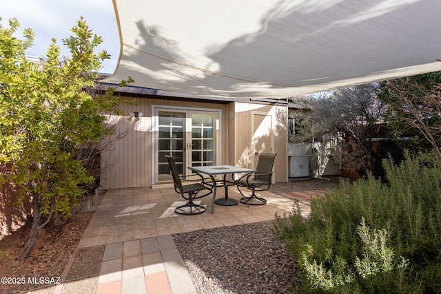 view of patio featuring french doors