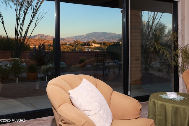 interior space featuring a patio area and a mountain view