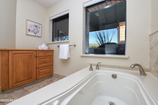 bathroom featuring a tub to relax in