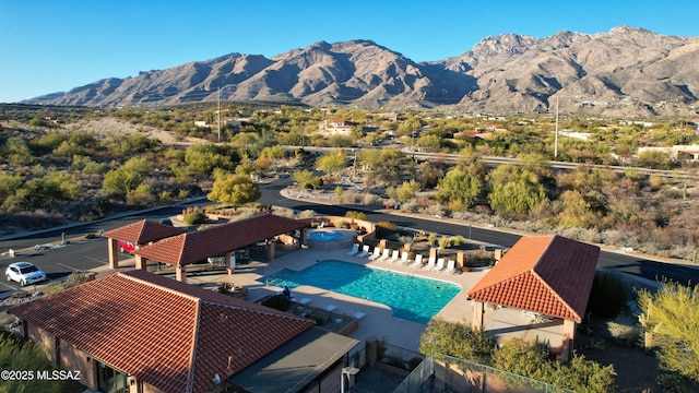 exterior space featuring a gazebo, a mountain view, and a patio