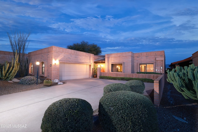 view of front of home featuring a garage