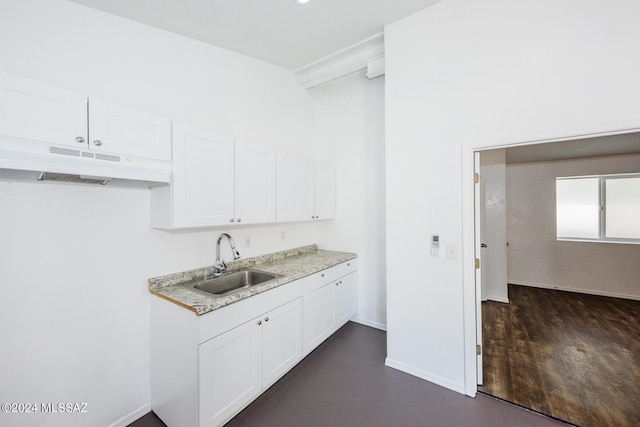 kitchen with sink and white cabinets