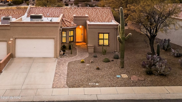 view of front of property featuring central AC unit