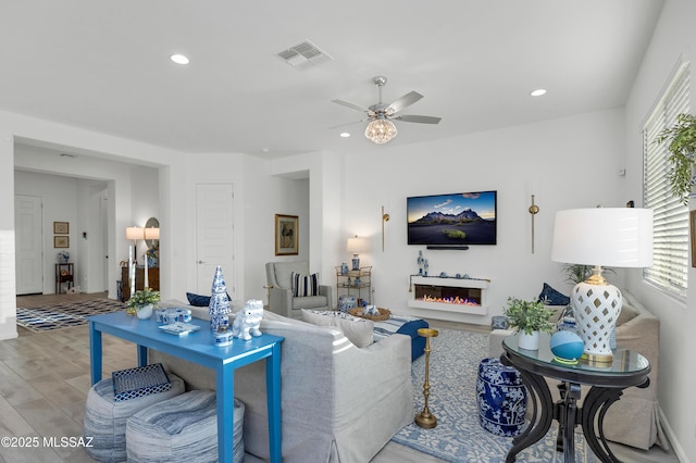 living room with ceiling fan