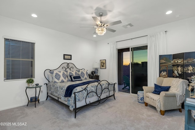 carpeted bedroom featuring ceiling fan and access to outside