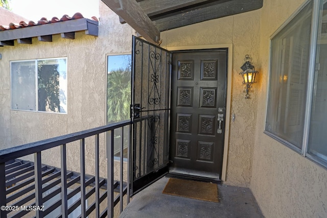 property entrance with a balcony