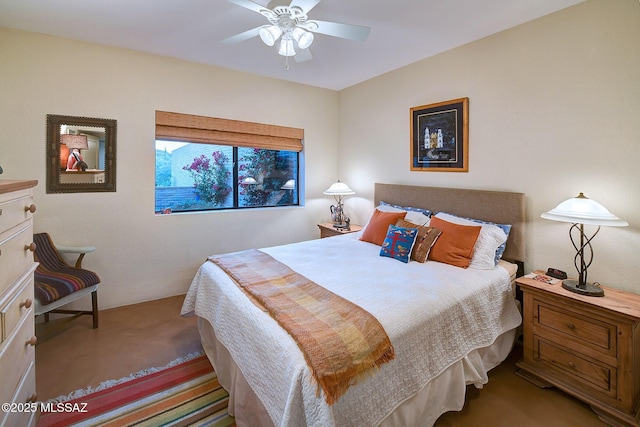 bedroom with light carpet and ceiling fan