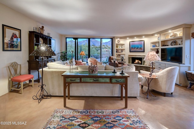 living room featuring built in shelves