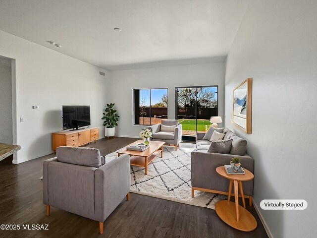 living room with dark wood-type flooring