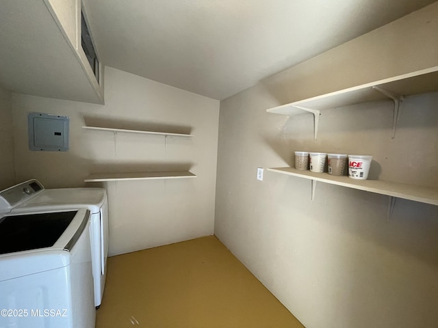 laundry area with separate washer and dryer and electric panel