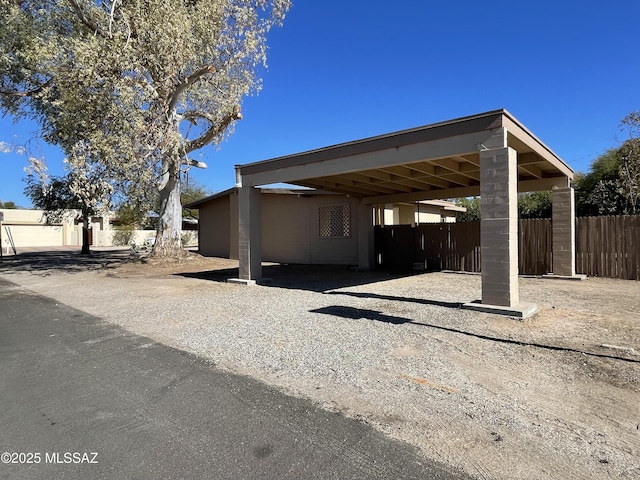 view of car parking with a carport