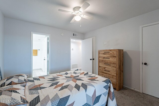 carpeted bedroom featuring ceiling fan and access to exterior