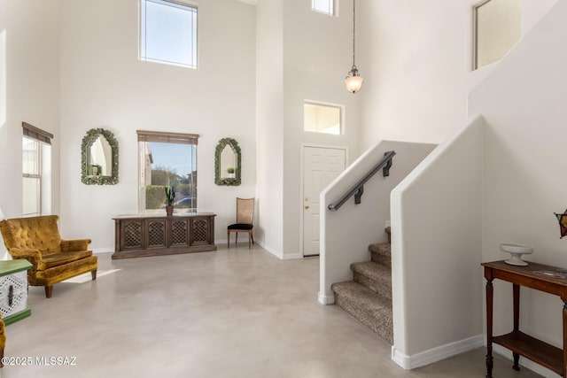 entrance foyer with a towering ceiling