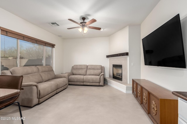 living room featuring ceiling fan