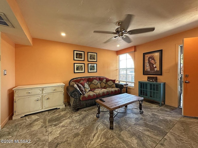 living room with ceiling fan