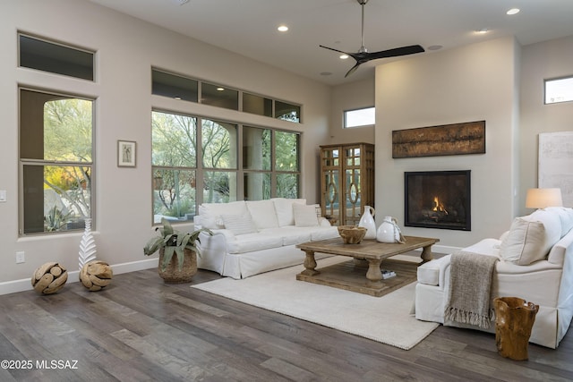 living room with dark hardwood / wood-style floors