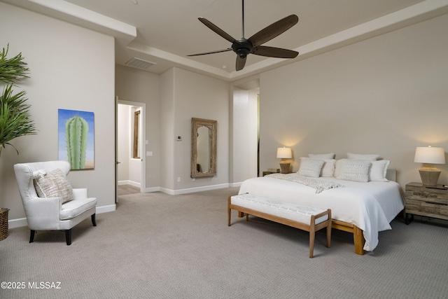 bedroom featuring light colored carpet and ceiling fan