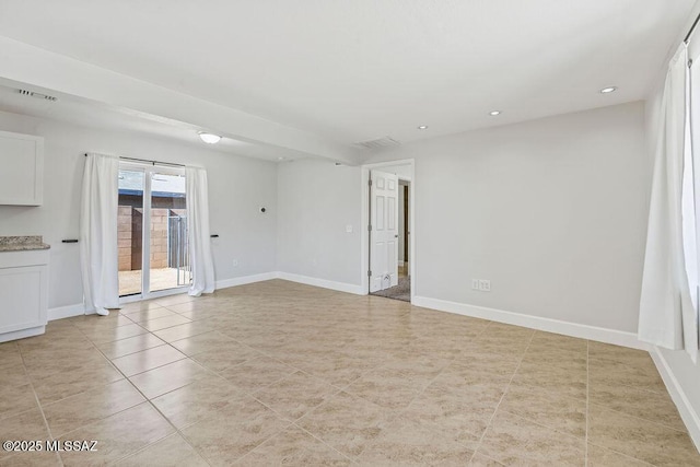 empty room featuring light tile patterned flooring