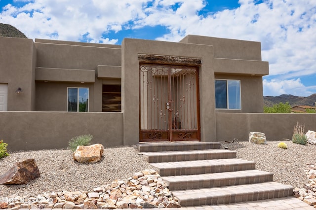 property entrance with a mountain view