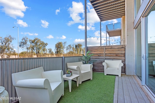 view of patio / terrace featuring a balcony and outdoor lounge area