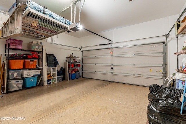 garage featuring a garage door opener