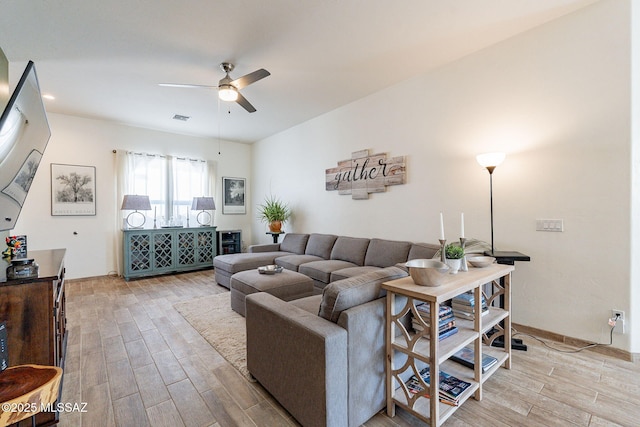 living room with ceiling fan