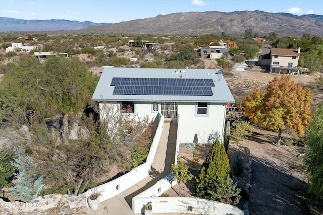 drone / aerial view featuring a mountain view