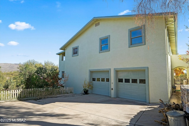 view of home's exterior with a garage