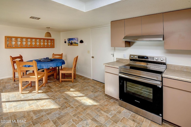 kitchen featuring ventilation hood, hanging light fixtures, and stainless steel electric range