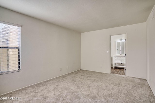 unfurnished bedroom featuring carpet floors