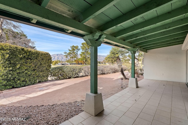 view of patio with a mountain view