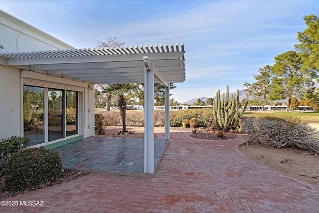 view of patio / terrace featuring a pergola