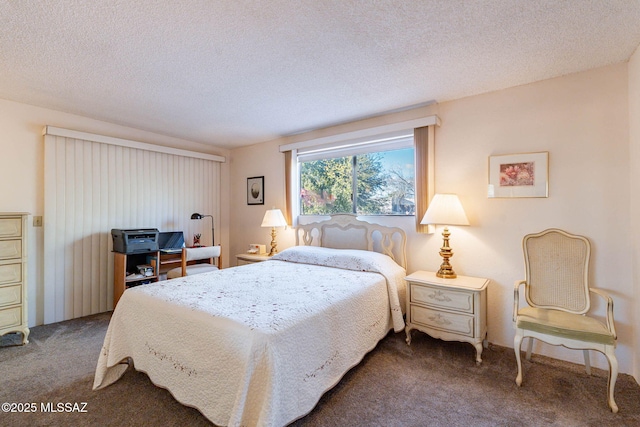 carpeted bedroom with a textured ceiling