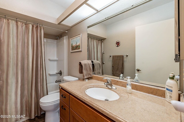 full bathroom featuring toilet, vanity, and shower / bathtub combination with curtain