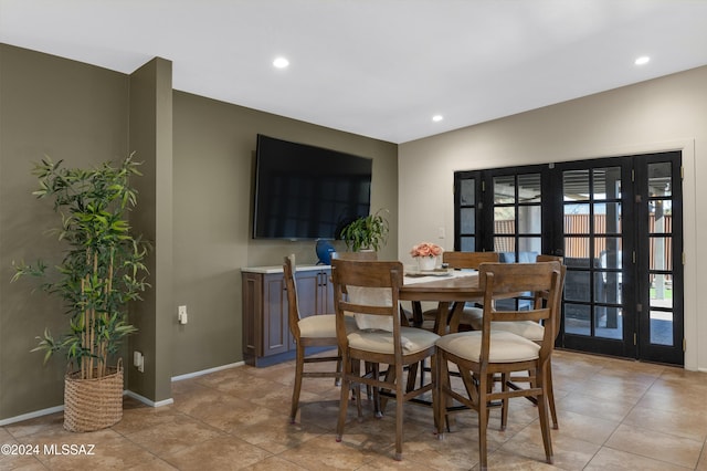 tiled dining room with french doors