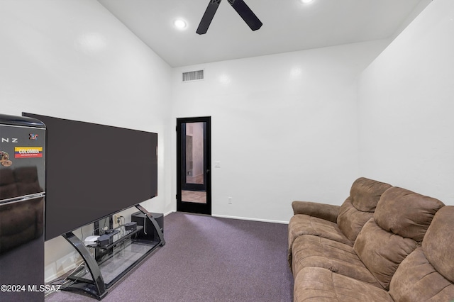 living room featuring ceiling fan and carpet flooring